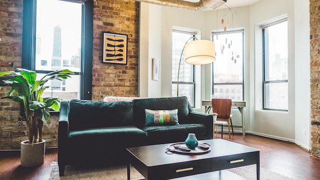 living room with green couch